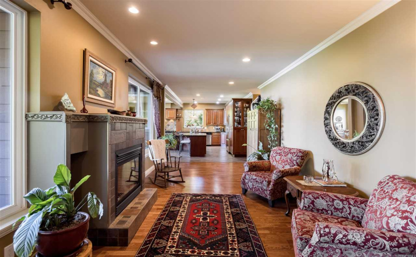 With gas fireplace adjoining the kitchen
