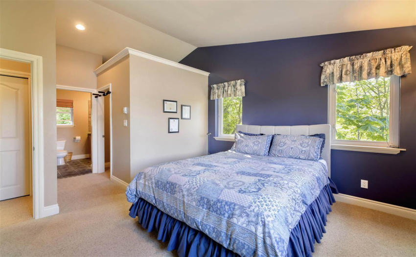 Walk-in closet and ensuite included in this lovely ocean view bedroom