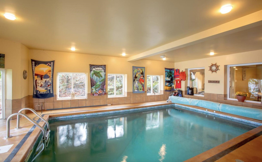Indoor pool with swim jets and ocean views