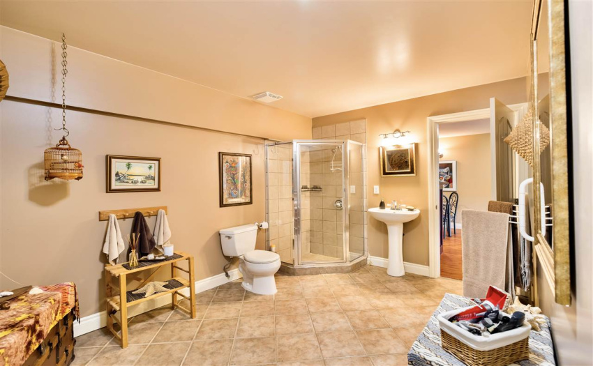 Extra large lower bathroom next to pool area with room for sauna.