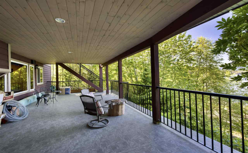 Covered ground floor balcony with access to indoor pool