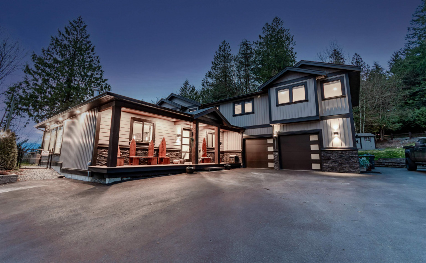 A welcoming front entrance.  This home was constructed to encapsulate the views and to create a luxury home living experience.  Masterfully designed and built with care.  The designer finishing will definitely impress.