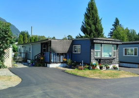 This home has a Mountain backdrop and lovely, private yard. (The home next door is being rebuilt.)