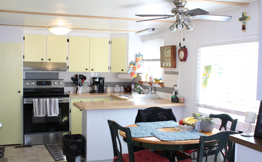 Bright kitchen with newer appliances, new blinds