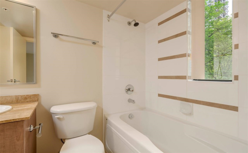 Ensuite Four Piece Bathroom Features A Standing Shower & Separate Tub