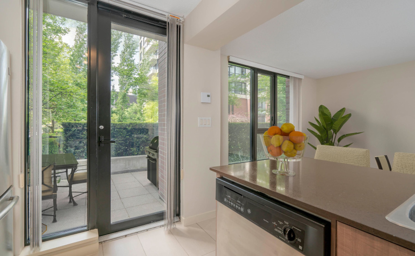 Kitchen & Private Patio In The Back Of The Townhome Facing A Park & Playground