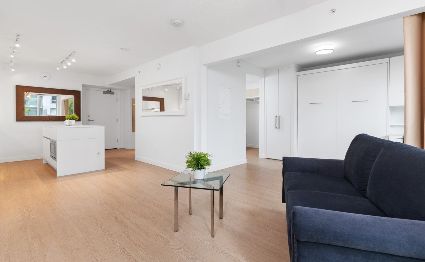 Welcoming open layout, Queen Murphy w/privacy curtain, open area concept and a built-in guest twin bed. Functional extendable table, seat 2 to 9 guests. Includes loveseat, TV, 2 mirrors, custom built cabinets, MOVE IN ready. No need to buy any furniture.