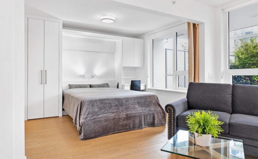 Welcoming open layout, Queen Murphy w/privacy curtain, open area concept and a built-in guest twin bed.  No need to buy beds, all included in the price.  Saves you buying furniture.