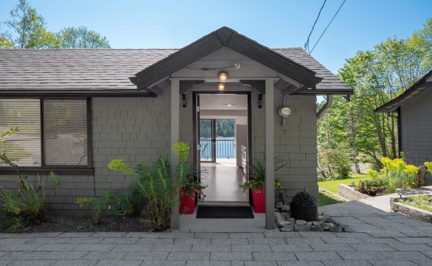 View of the water through this quaint cottage