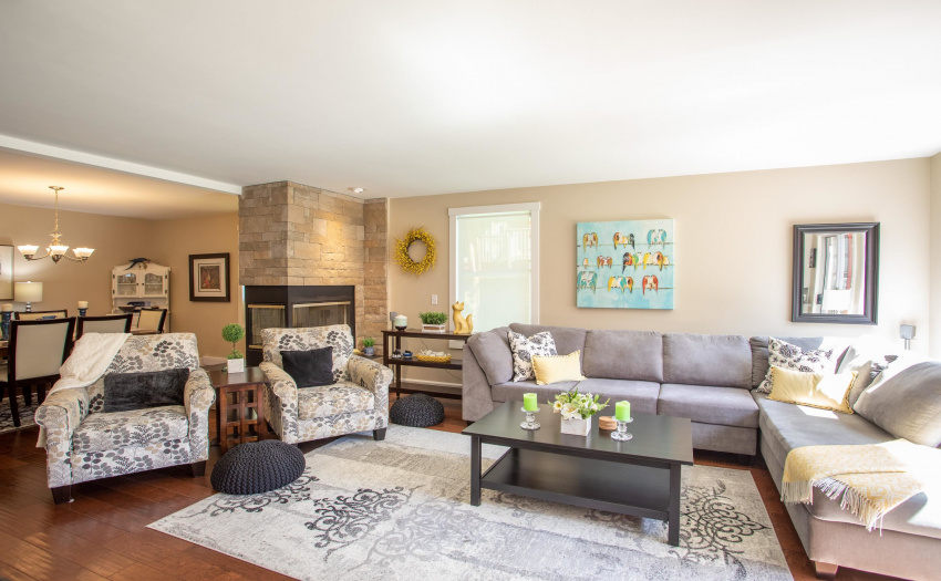 Living room off of Kitchen with wood burning fireplace