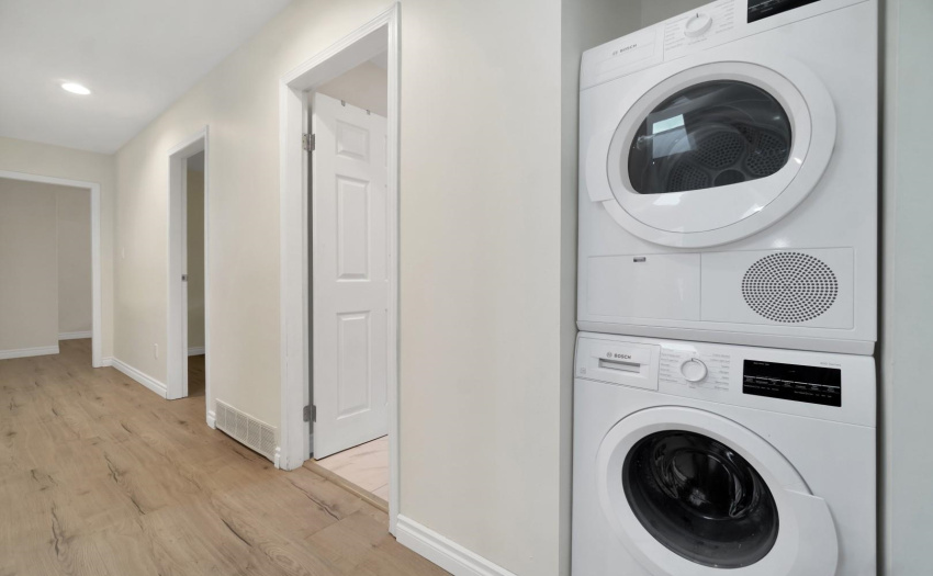 Note: door has been added to cover washer/dryer.