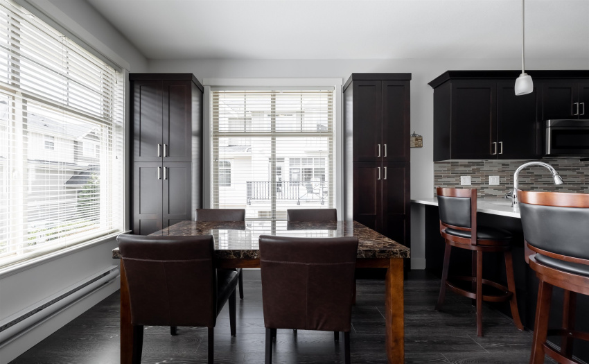 Custom built cabinets to match the kitchen for extra storage.