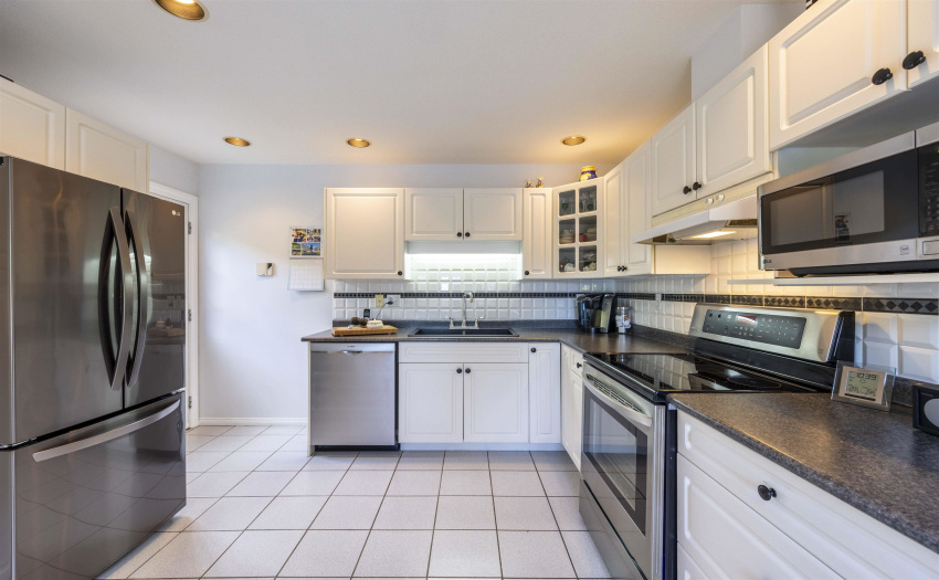 BRIGHT, SPACIOUS WITH NEWER S/S APPLIANCES