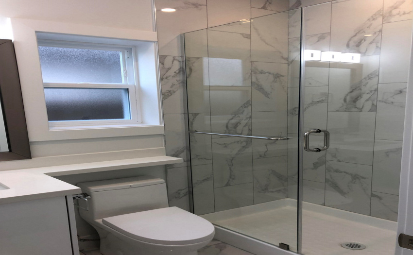 Main floor front bedrom ensuite walk in shower