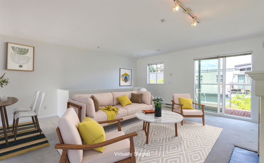 View to the living room and balcony overlooking the complex