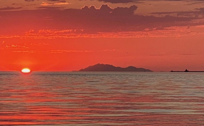 Sunset views from the flex/2nd master bedroom looking towards Texada Island.