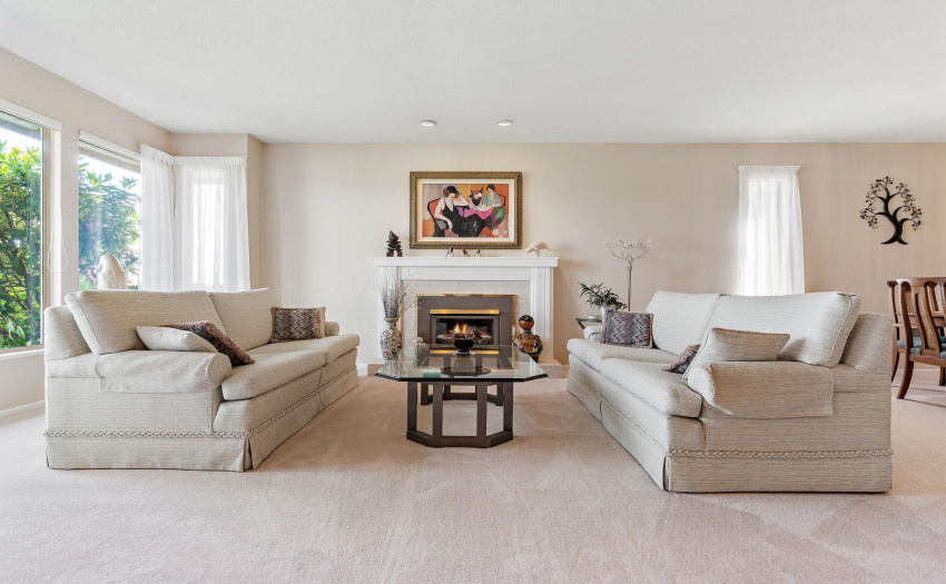 Comes with gas chimney and views looking towards the landscaped front yard and the river walk.