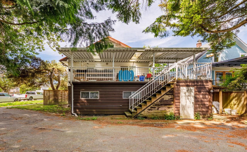 Rear of the house, with sundeck (327 SQFT) and built-in shed (47 SQFT).