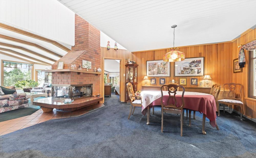 A 3 way fireplace is smartly place to be enjoyed by all whether in the living room, dining room or kitchen.