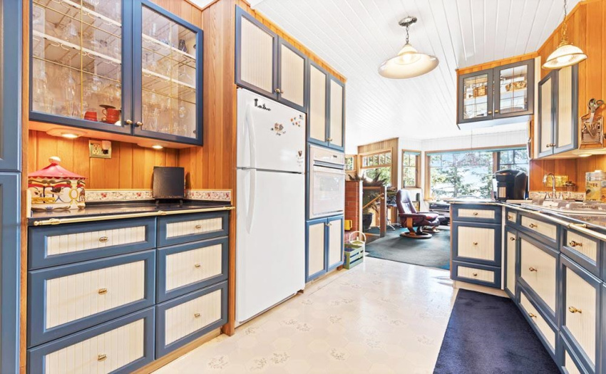 Designed by someone who loves cooking, this kitchen has loads of the storage we all need and a hidden pantry!