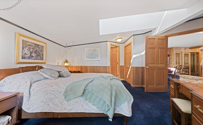 This bedroom has its own en-suited bathroom too.