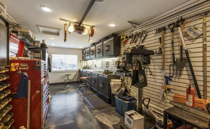 Third Bay on Garage is a dream workshop or parking for another vehicle.  Floors are epoxy coated.
