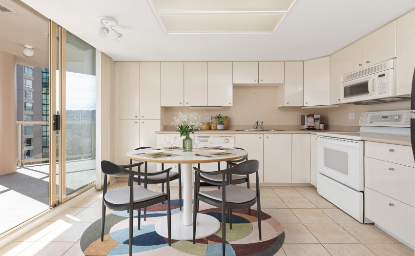Virtually staged. Ample cupboards to support all your culinary needs.