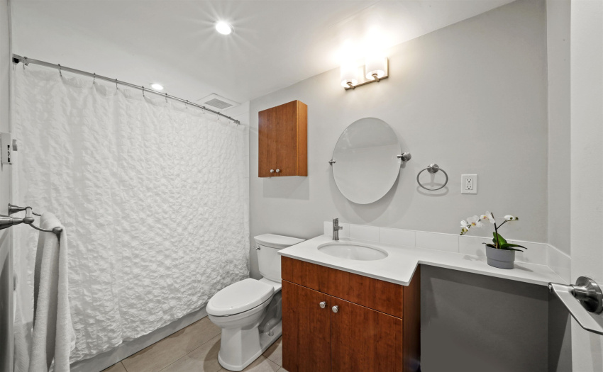 Third full bathroom with extra storage in the utility closet behind door. Hot water tank replaced in 2018
