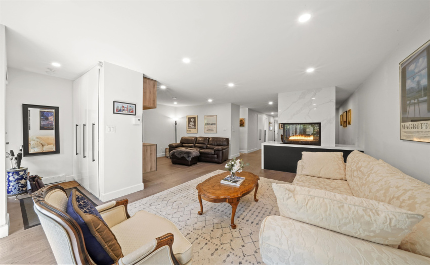 Wide-plank engineered hardwood flooring & recessed lighting done in 2016 along with many other updates