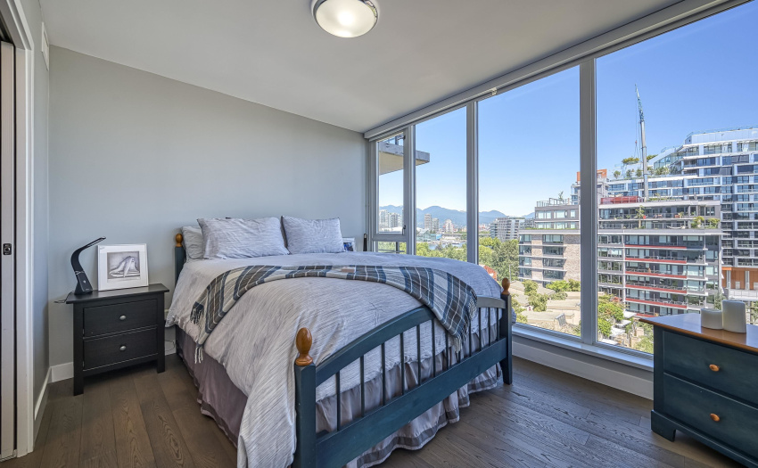 Primary bedroom has great views of the city, False Creek and North Shore mountains
