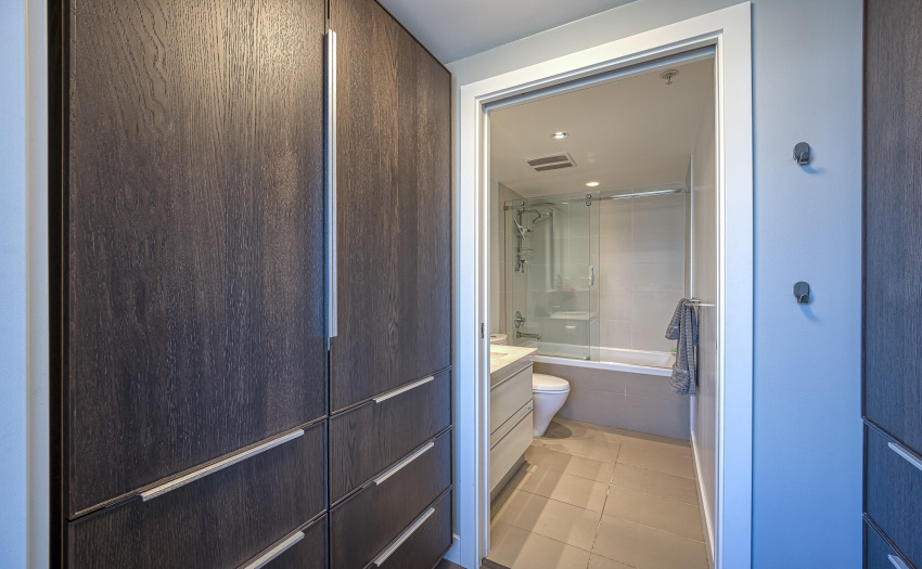 Walk-through closet in the Primary Bedroom