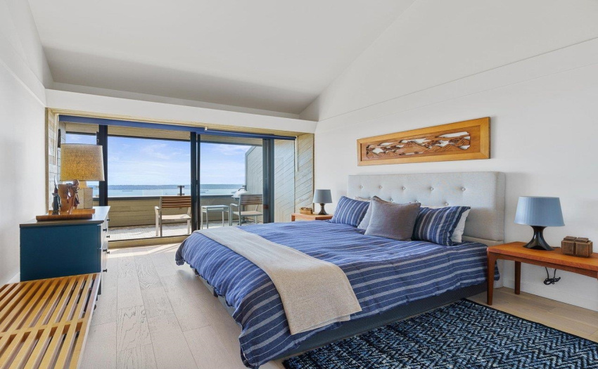 Expansive master with full width deck and views