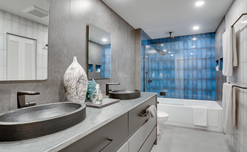 Designer Riobel faucets, metal sinks, Italian and Spanish tiles