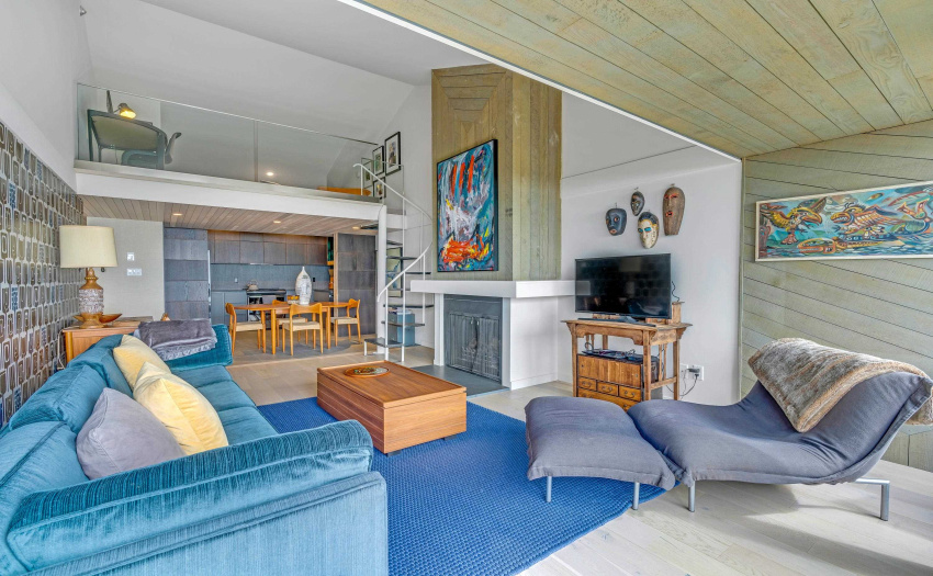 Accommodates large furniture so all can gather in front of the wood burning fireplace