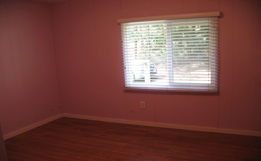 Second bedroom with shelving.