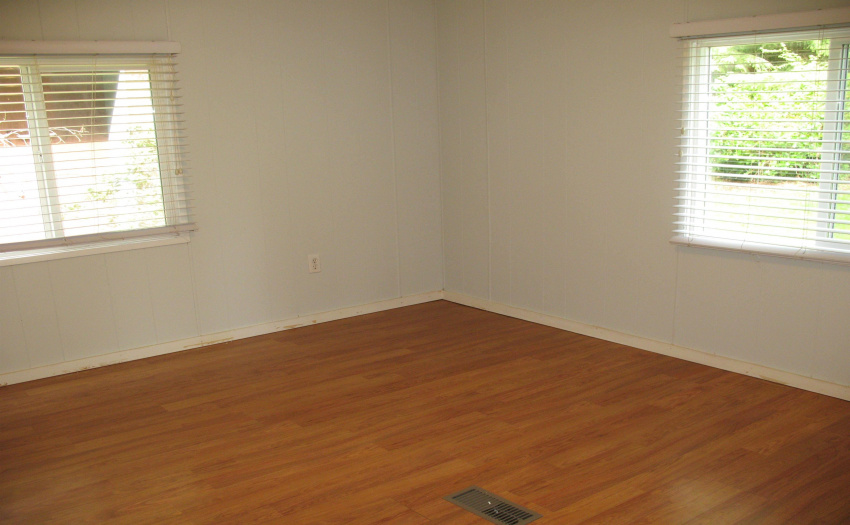 Large master bedroom with a walk in closet and full 4 piece ensuite is very spacious and quiet since it sits at the back of the home and property.