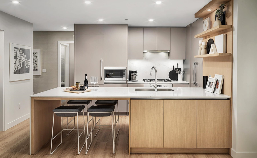 An abundance of smart storage and drawer space, alongside quartz countertops, offer a polished look and finish.