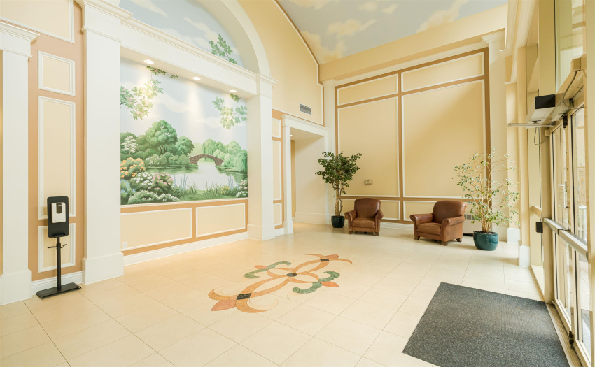 entrance with magnificent hall, high ceiling and artwork