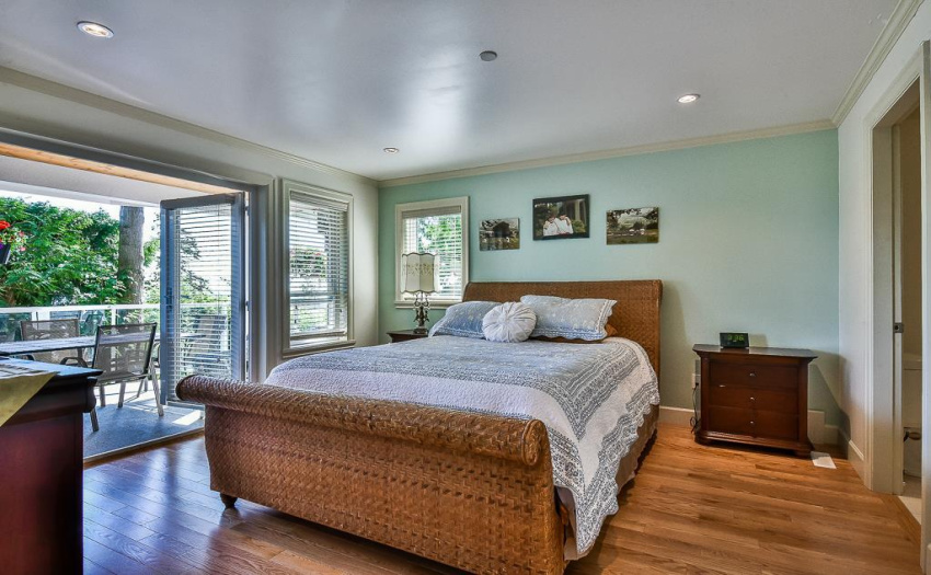 This home has two master bedrooms.  One on main and one on middle floor.  Attached ocean view patio plus ensuite and walk-in closet.
