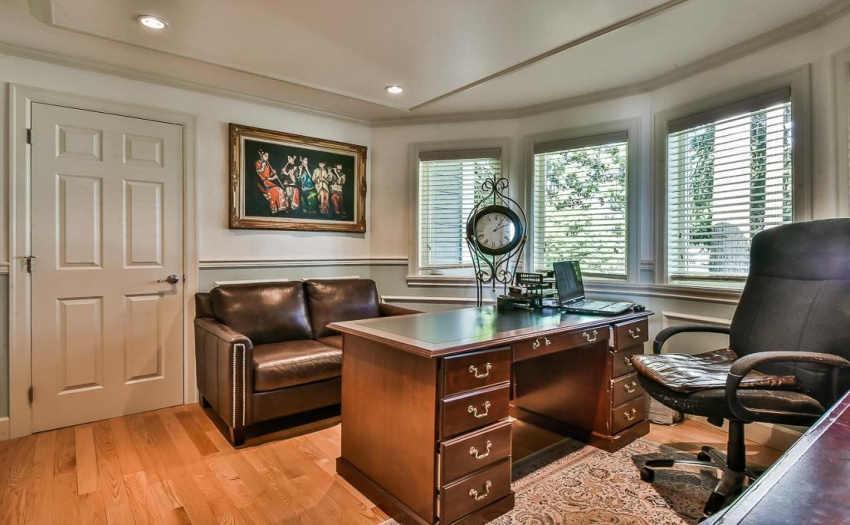 Very large office.  Room for desk, credenza and small sofa.  No need for filing cabinets as there are two closet areas with built in shelving to hold office supplies and files.