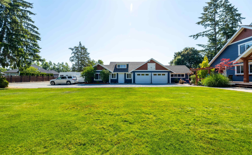 2 car garage, attached workshop & coach house entrance
