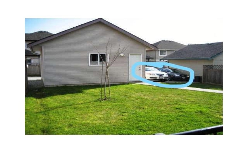 two car garage, plus 2 parking pads