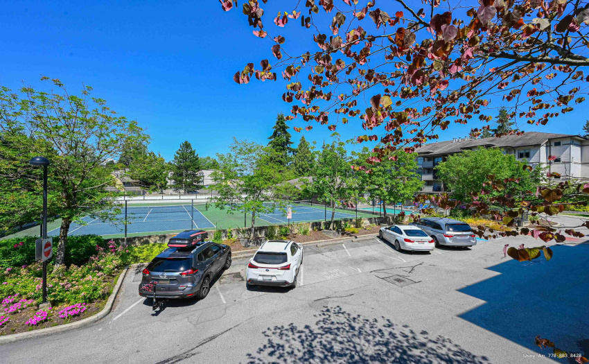 Tennis court and parking lot