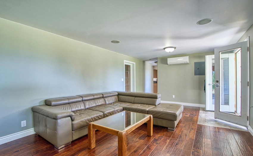 Features spacious living room.