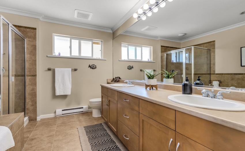 Soaker tub and separate shower plus two sinks and lots of cabinet space for personal items