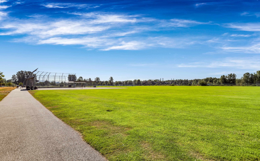 Just a short walk to PMAP; Courts, rink, playground and ball parks.