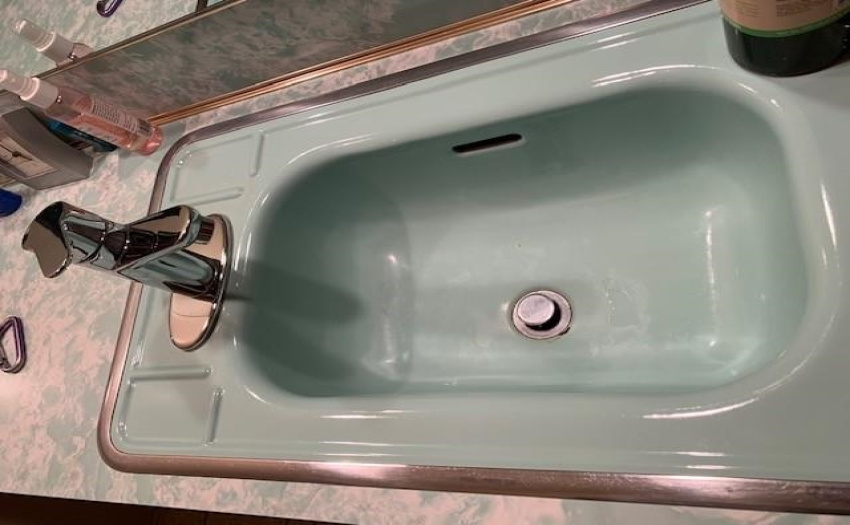 Bathroom fixtures are original but in mint condition.