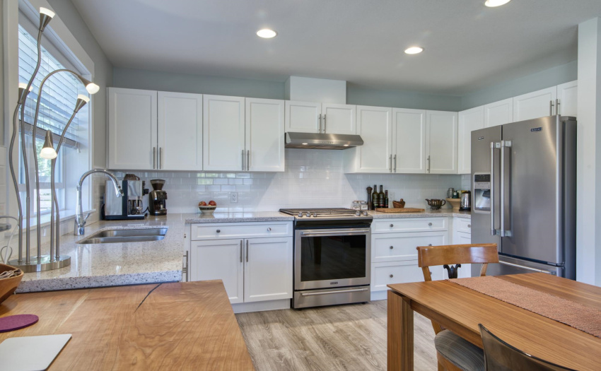Stainless appliances and solid surface countertops