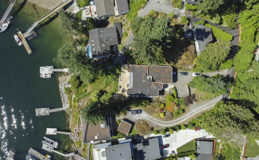 Aerial view of home, huge lot & dock.