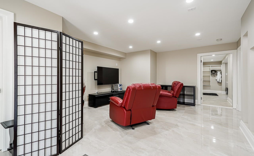 Entry level features a family room, perfect for watching movies and relaxing by the cozy gas fireplace.